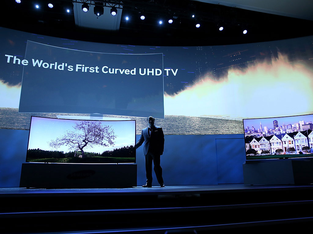 Samsung Electronics Executive Vice President Joe Stinziano announces the new Samsung 105 inch curved UHD television